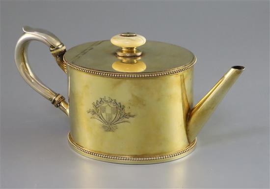 An 18th century French silver gilt oval teapot by Henri-Auguste, Paris, 1786, gross 24.5 oz.